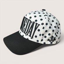 Load image into Gallery viewer, August Owl Gameday cap in white with black polka dots, featuring black puff embroidery and a solid black curved brim.