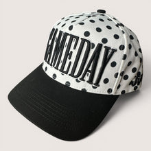 Load image into Gallery viewer, August Owl Gameday cap featuring a white and black polka dot pattern with bold black puff embroidery and a black bill.
