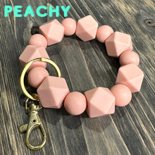 Load image into Gallery viewer, Large Peachy Silicone keychain with hexagon and round silicone beads and gold hardware.