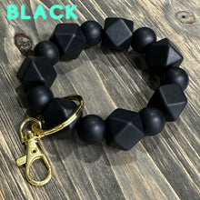 Load image into Gallery viewer, Large black Silicone keychain with hexagon and round silicone beads and gold hardware.