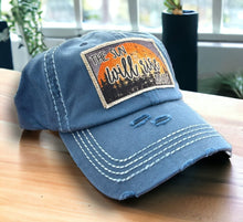 Load image into Gallery viewer, The Sun Will Rise Again Patch Hat. the hat is a washed blue with white stitching.
