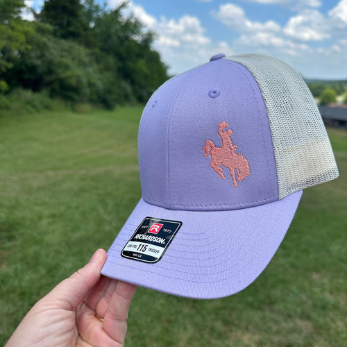 Lilac Embroidered Cowboy Richardson Low-Pro 115 Trucker hat. Embroidery is pink
