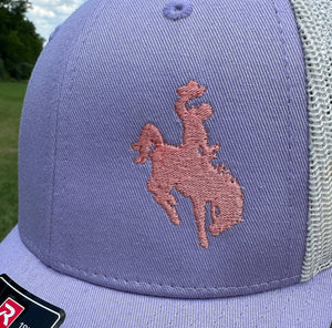 Lilac Embroidered Cowboy Richardson Low-Pro 115 Trucker hat. Embroidery is pink