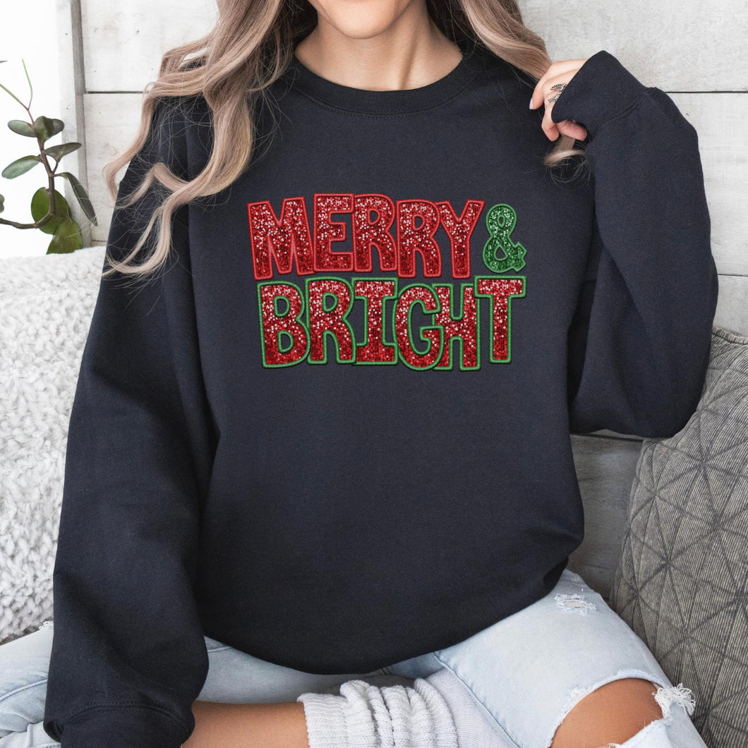 Black Gildan crewneck sweatshirt with a Merry and Bright faux embroidery sequin design