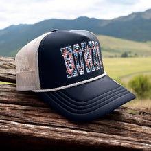 Load image into Gallery viewer, A black trucker hat with ivory mesh and ivory rope across the front. It has a southwest design on the word,HOWDY.