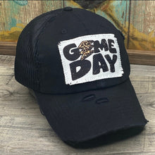 Load image into Gallery viewer, Black Mesh low profile and unstructured baseball hat. It has a white rectangle frayed edge patch that says, &quot;Game Day&quot; in bold black letters, The A in the word Game is replaced with a leopard print lightning strike
