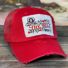 Load image into Gallery viewer, Red mesh trucker hat. It&#39;s low profile and unstructured.It has a distressed raggy white fabric rectangle hat patch that says, &quot;The Hell I Won&#39;t&quot; with a western woman theme.