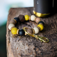 Load image into Gallery viewer, Gold, Black, Coffee, and Cream Wood Wristlet Keychain, Gold Hardware