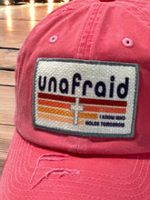 Load image into Gallery viewer, Close up photo of patch - Embroidered edge patch hat. The rectangle patch says, &quot;unafraid, I know who holds tomorrow&quot; with a retro line design and cross in the middle. The image is printed onto the patch and edge is embroidered.