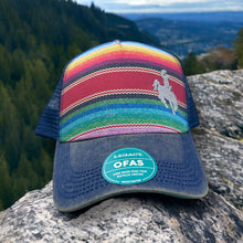 Load image into Gallery viewer, Western colorful striped trucker hat with bucking horse and cowboy embroidered on the right front side.